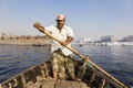 Dhaka, Bangladesh, February 24 2017: Close-up view of a rower in a taxi boat from the perspective of the passenger Royalty Free Stock Photo