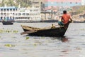 Dhaka, Bangladesh, February 24 2017: Small rowboats serve as taxi on the river in Dhaka