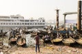 Dhaka, Bangladesh, February 24 2017: Small rowboats serve as taxi between the two river banks on the Buriganga River in Dhaka