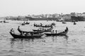 Dhaka, Bangladesh, February 24 2017: Small rowboats serve as taxi boat on the river