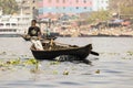 Dhaka, Bangladesh, February 24 2017: View of an old muslim rower on a river in Dhaka Royalty Free Stock Photo