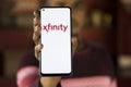 Dhaka, Bangladesh - 12 January 2024: Xfinity logo on smartphone.