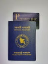 Dhaka, Bangladesh, 06 June 2020. Passport kept on white background with Priority pass to access International airport lounges in