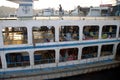 Dhaka, Bangladesh: People on a ferry at the dock at Sadarghat in Dhaka