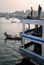 Dhaka, Bangladesh: People on a ferry at the dock at Sadarghat in Dhaka