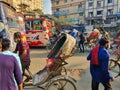 Dhaka,Bangladesh-11.24.2020: Rickshaw pullers working with masks on in the streets of one of the most busiest junction of Dhaka,