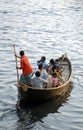 Dhaka, Bangladesh: Transporting local people by small boat across the river at Sadarghat, Dhaka Royalty Free Stock Photo