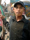 Dhaka, Bangladesh: A young rickshaw driver in Dhaka