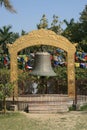 Bell and arch in the grounds of the Dhamek Stupa - Sarnath