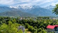 Dharamshala of Himachal Pradesh surrounded by cedar forests and Dhauladhar mountain range