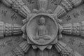 Dharma wheel with Buddha in the center found at a South Korean Buddhist temple