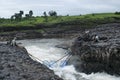 DHARNI, AMRAVATI, MAHARASHTRA, August 2018, Fisherman fishing with nets at Utawali waterfall at Utawali Village