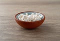 DHEA pills in a bowl on a table side view Royalty Free Stock Photo