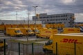 DHL delivery vans in front of Royalty Free Stock Photo