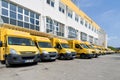 DHL delivery vans at depot in Siegen, Germany. Royalty Free Stock Photo
