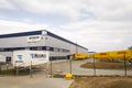 DHL and Hermes shipping containers in front of Amazon logistics building on March 12, 2017 in Dobroviz, Czech republic.