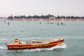 DHL post boat in the Venice canal, Italy