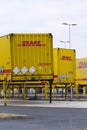 DHL shipping containers in front of Amazon logistics building on March 12, 2017 in Dobroviz, Czech republic. Royalty Free Stock Photo