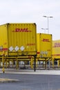 DHL shipping containers in front of Amazon logistics building on March 12, 2017 in Dobroviz, Czech republic.