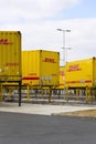 DHL shipping containers in front of Amazon logistics building on March 12, 2017 in Dobroviz, Czech republic.