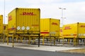 DHL shipping containers in front of Amazon logistics building on March 12, 2017 in Dobroviz, Czech republic.