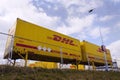 DHL shipping containers in front of Amazon logistics building on March 12, 2017 in Dobroviz, Czech republic.