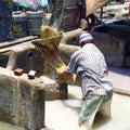 A Dhobi (clothes washer) in Dhobi Ghat, Mumbai India