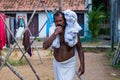 Laundry open air, Hand washed clothes drying in sunlight in Cochin, India.