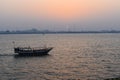 Dhow boat on sea at sunset in Doha Royalty Free Stock Photo