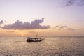 Dhow boat at sunset and background clouds Royalty Free Stock Photo