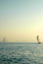 Dhow and Burj Al Arab in the Gulf Royalty Free Stock Photo