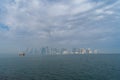 A traditional dhow in Doha, Qatar with the city`s modern skyline in the background. Royalty Free Stock Photo