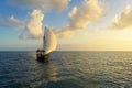 Dhow at sunset and background clouds Royalty Free Stock Photo