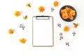 Dia de los Muertos, Mexican Day of the Dead composition. Clipboard, blank paper mockup, orange tagetes, marigold flowers Royalty Free Stock Photo