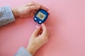 Diabetes concept. Woman doing blood glucose measurement. Royalty Free Stock Photo