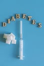 Diabetes inscription on a blue background. copy space. vertical photo