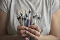 Diabetes insulin dependent concept, hands with syringes pen injectors with doses of humalog for subcutaneous abdomen injection Royalty Free Stock Photo