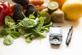 Diabetes monitor, diet and healthy food eating nutritional concept with clean fruits and vegetables with diabetic measuring tool Royalty Free Stock Photo