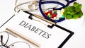DIABETES text and Background of Medicaments, Stethoscope