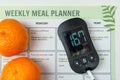 Diabetes treatment kit with digital blood glucose meter, lancing device. Weekly healthy diet plan. Control of excess blood sugar.