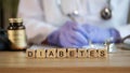 Diabetes word collected with wooden cubes in row Royalty Free Stock Photo
