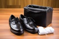 a diabetic foot care kit next to a pair of shoes Royalty Free Stock Photo