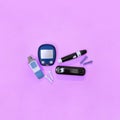 Diabetic kit: two types of glucometers, test strips, lancet. Royalty Free Stock Photo