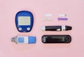 Diabetic kit: two types of glucometers, test strips, lancet. Royalty Free Stock Photo