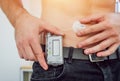 Diabetic man with an insulin pump connected in his abdomen Royalty Free Stock Photo