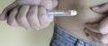 Diabetic patient makes an insulin injection. Treatment and control diabetes concept