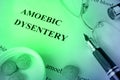 Diagnosis amoebic dysentery written on a page. Royalty Free Stock Photo