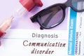 Diagnosis of Communication Disorder. Hourglass, doctor glasses, mental status exam are near inscription Communication Disorder. Ca