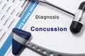 Diagnosis of Concussion. Two neurological hammer, result of mental status exam and name of neurologic psychiatric diagnosis Concus Royalty Free Stock Photo