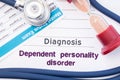 Diagnosis of Dependent Personality Disorder DPD. On psychiatrist or psychologist table is paper with inscription Dependent Perso